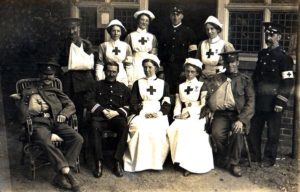 This World War 1 postcard depicts Red Cross V.A.D. nurses and soldiers. Photo credit https://www.worldwar1postcards.com/